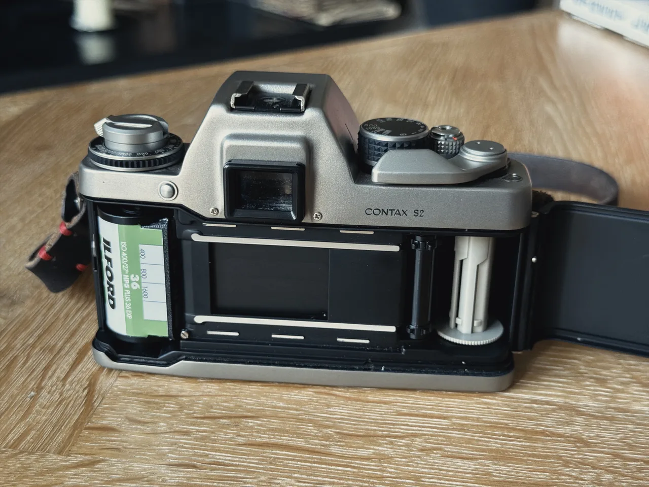 The Contax S2 with its back open, loaded with a roll of Ilford HP5 Plus