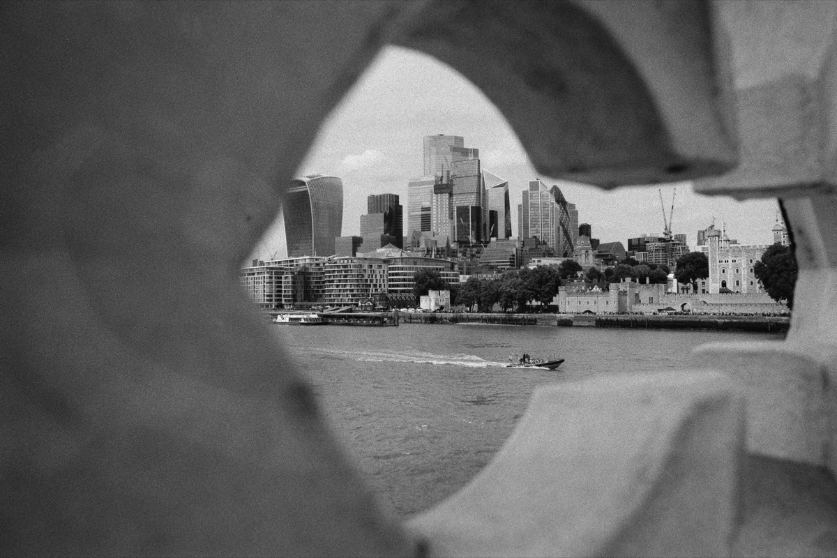 City of London skyline framed through a sculpture