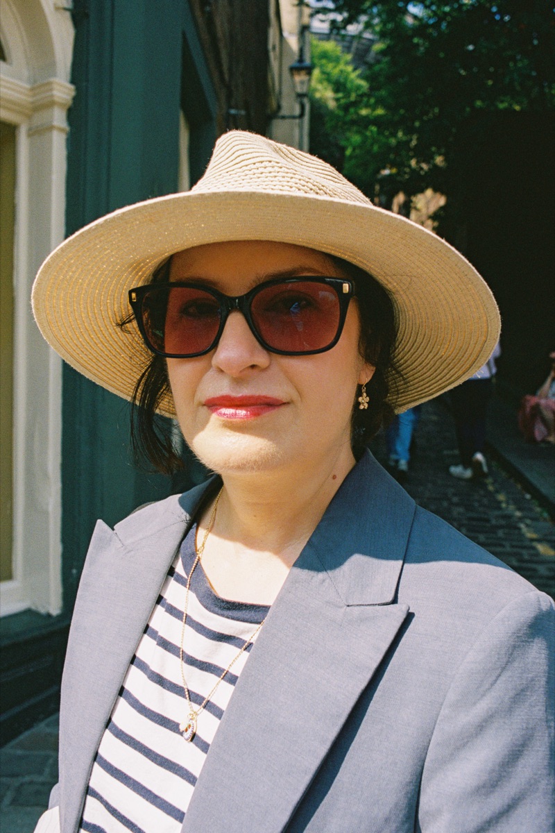 Woman in a straw hat and sunglasses